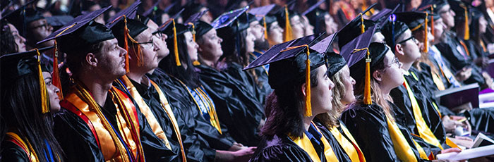 Pima Graduates watch commencement speaker