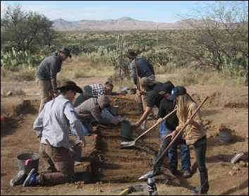 Image of students digging